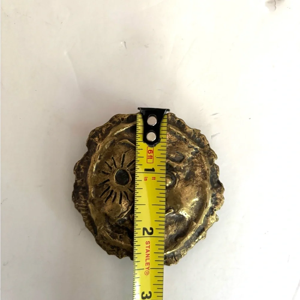 Three vintage belt buckles